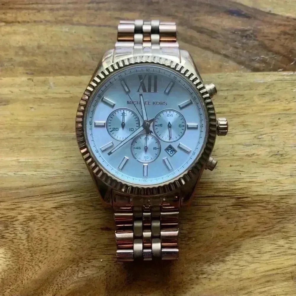 MK gold wristwatch